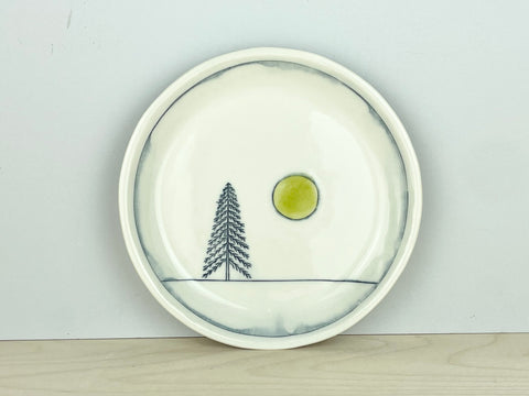 Lonely pine at night lunch plate